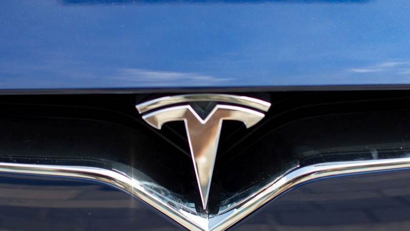 Tesla shares up 4% amid EV market optimism