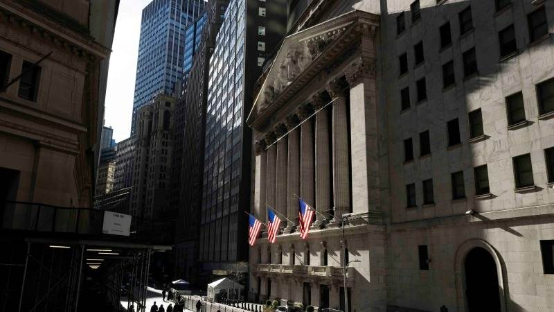 US lower premarket ahead of economic data, earnings