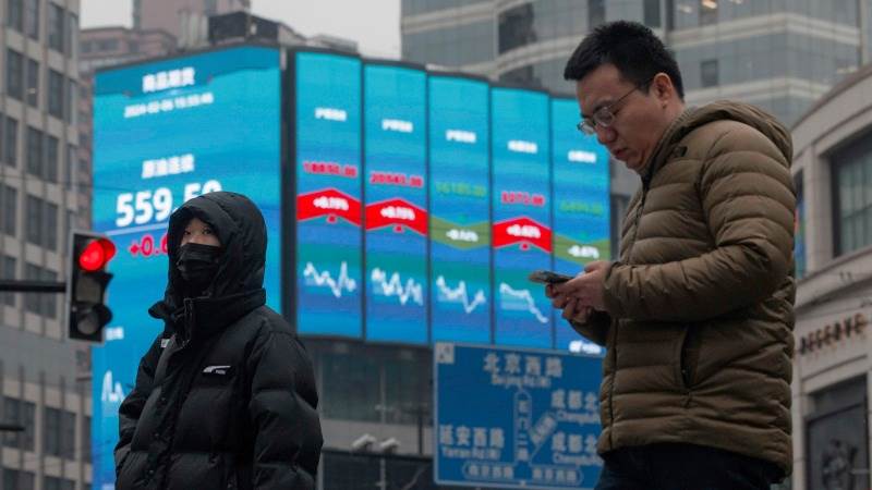 Asia mostly lower after service sector data