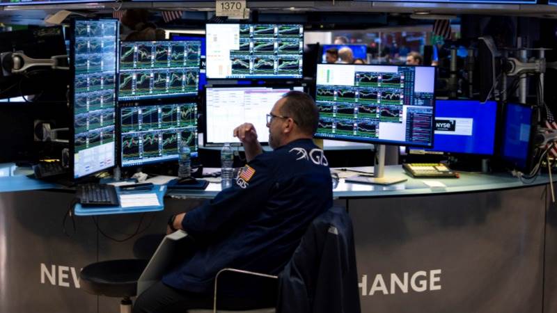 Wall Street higher at open as data pours in