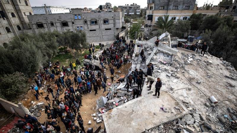 Israeli attack on aid-seekers kills 12, injures 100