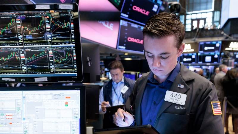 Wall Street closes in red amid data