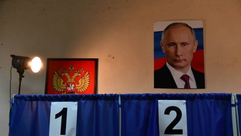 Putin wins 87% of the vote for fifth term, exit poll shows