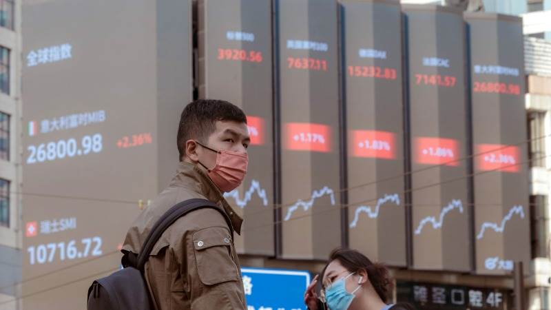 Asia mostly lower with Japan’s inflation in focus