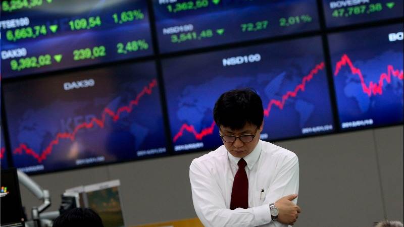 Asian markets mostly lower after Japan’s CPI