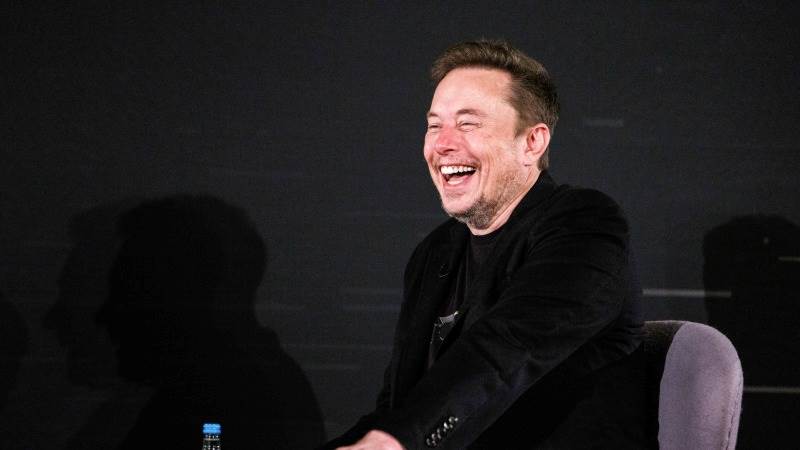 Musk denies report on canceling low-cost car plans