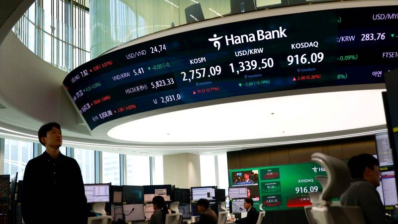 Asia trades higher with corporate news in focus