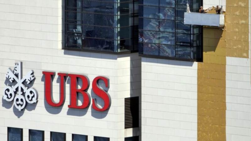 UBS surges 8% on upbeat results, return to profit