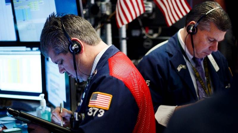 Wall Street closes mixed, Nasdaq 100 at record