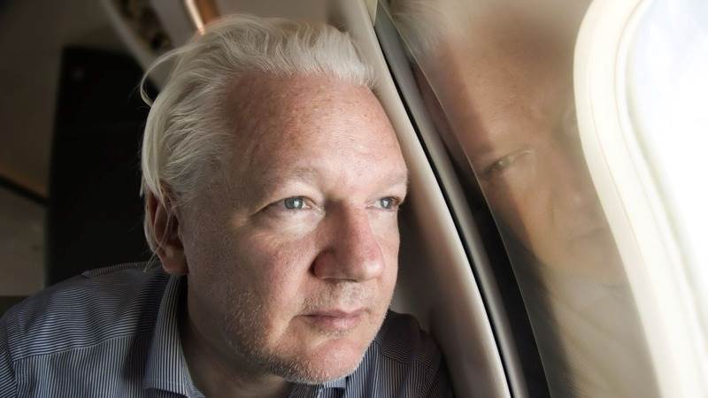 Assange walks free, sentenced to time already served