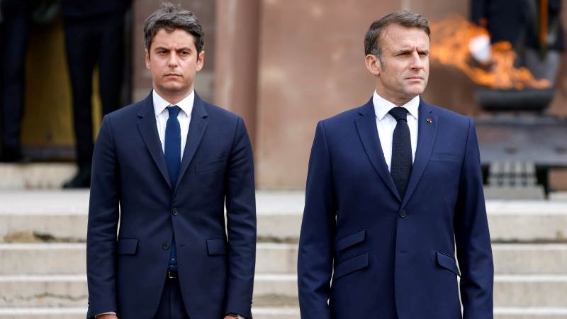 Macron asks Attal to stay on as PM ‘for the time being’