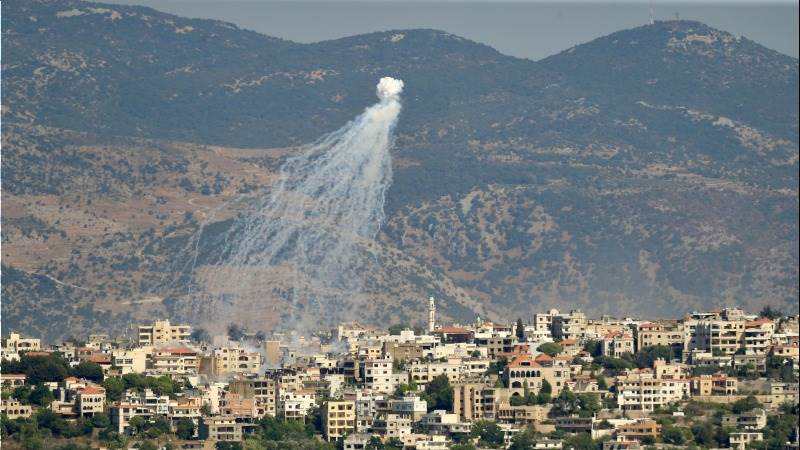 Israel hits two Hezbollah targets after 15 rockets launched