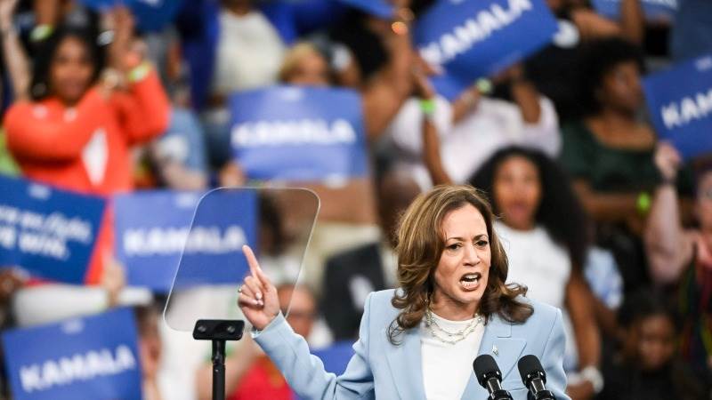 Harris lists Walz’s roles, compares him to JD Vance