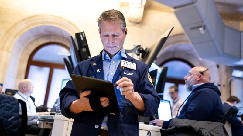 US opens higher as key data looms