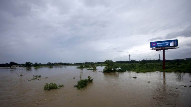 Hurricane Ernesto weakens into tropical storm