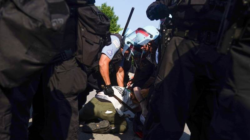 Four arrested after breaching fence near DNC