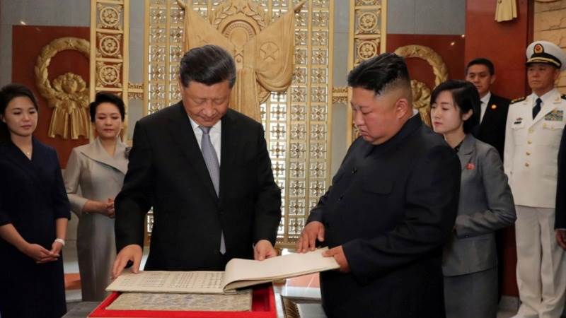 Xi, Putin vow to strengthen N. Korea ties