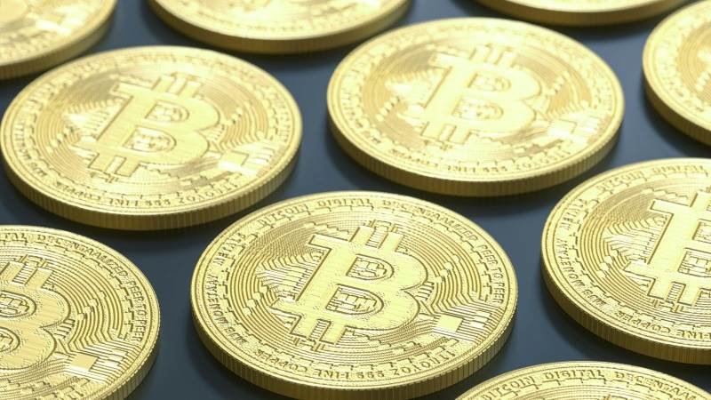 Cryptos rise with Bitcoin hitting $60,000