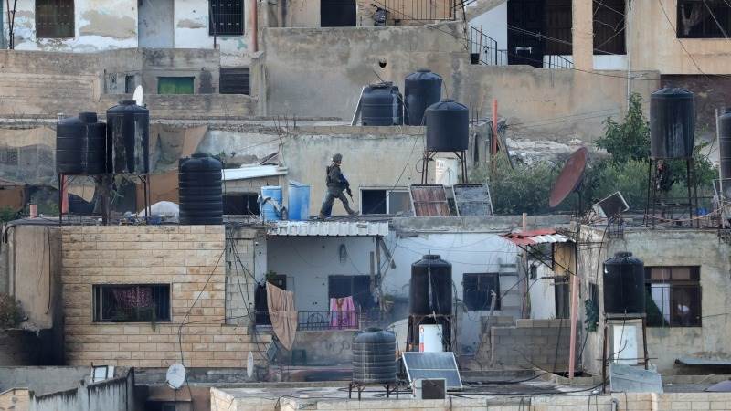 IDF probes footage of its soldiers shoving gunmen’s bodies off roof