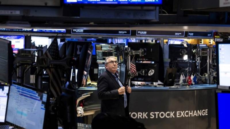 US opens lower after hitting record high