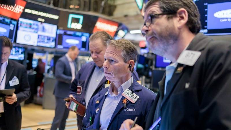 US opens lower as earnings season heats up