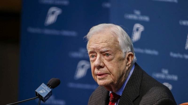 Former president Carter casts vote for Harris in Georgia