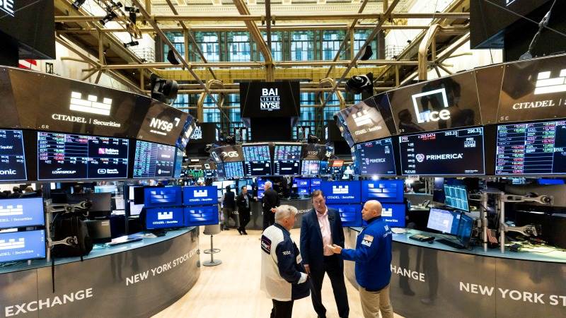 US closes lower following key data