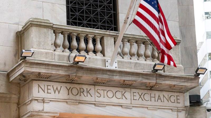 US closes higher after data reports