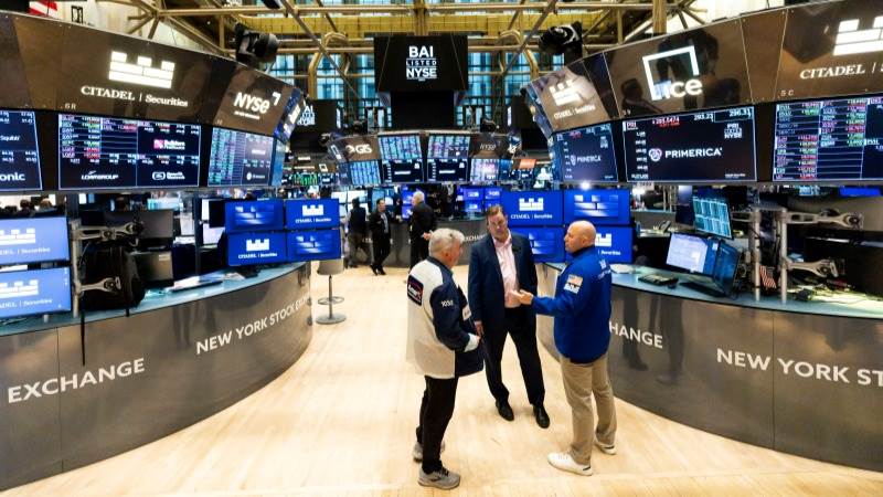 US markets open mostly lower as key data looms