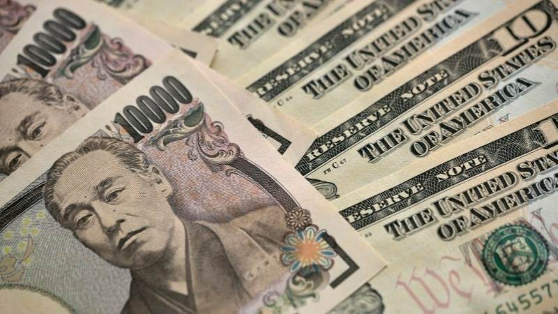 Dollar jumps to highest against yen since mid-July