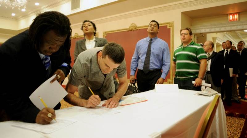 US initial jobless claims up by 14,000 to 217,000