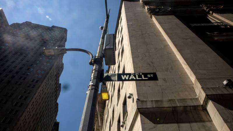 Wall Street opens flat to higher after data