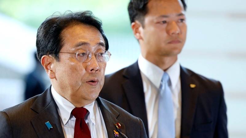 Japan’s economy minister says inflation closer to target