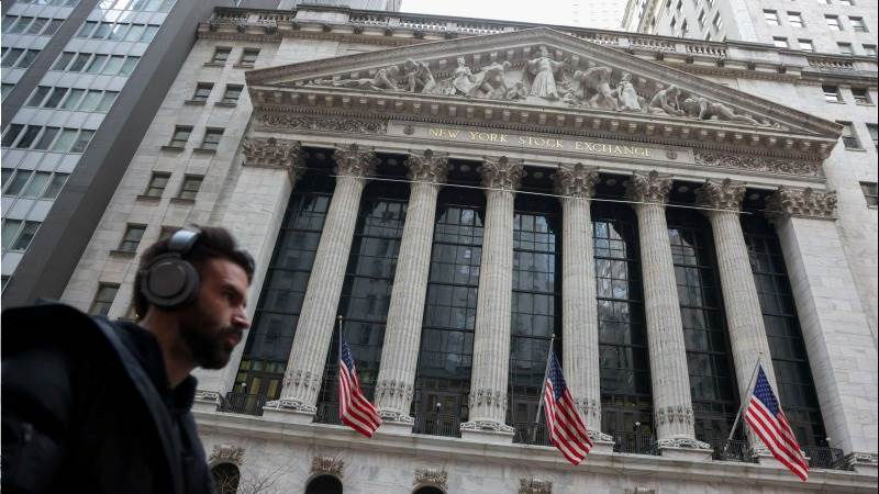 Wall Street mostly higher premarket with data in focus