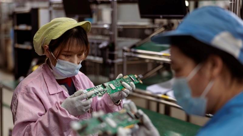 China’s manufacturing PMI rises to 50.2 in February