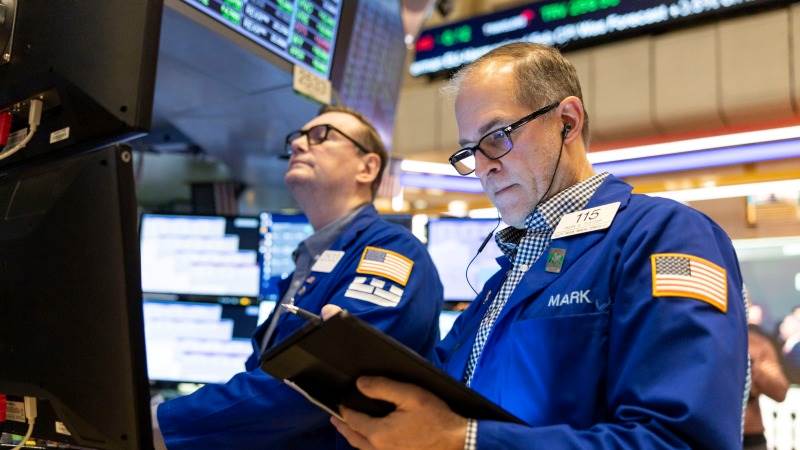 US closes higher as tariff delay lifts auto stocks