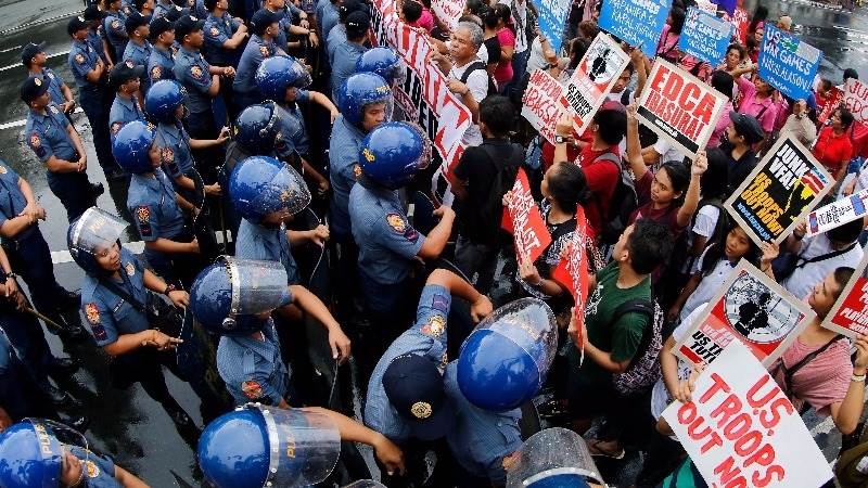 Police in Manila break up protest against U.S.