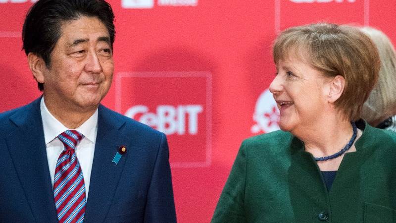 Abe: Japan, Germany should champion free trade