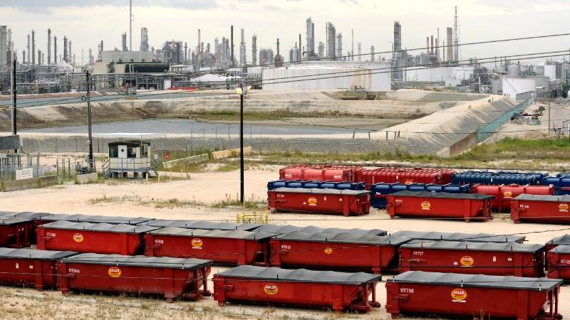 Crude holds gains on drop in US fuel reserves