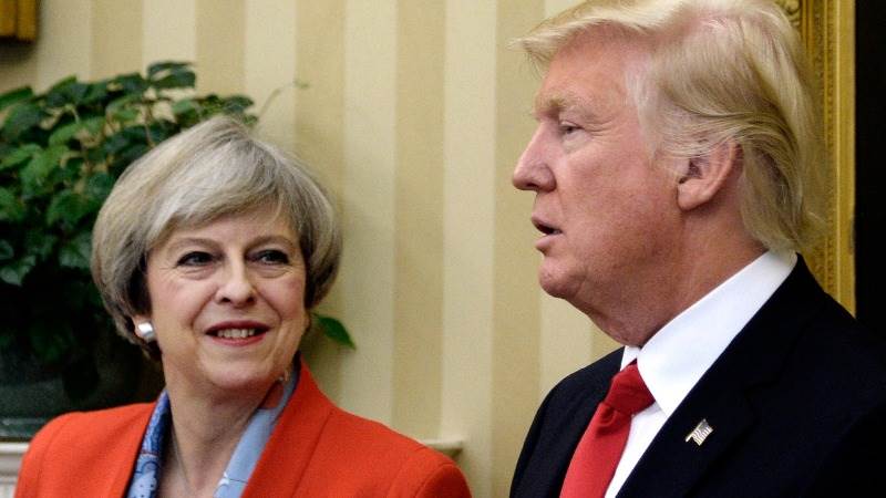 May, Trump ask officials to complete planning his UK visit