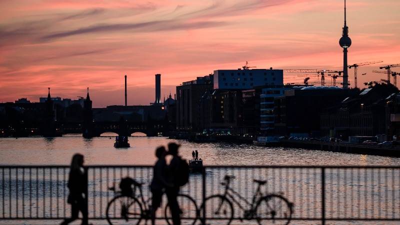 Europe opens mostly lower amid trade talks