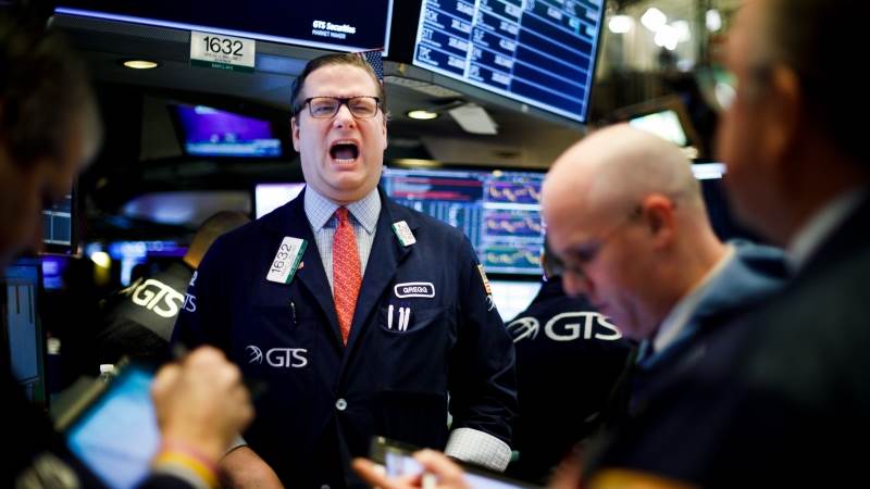 Wall Street ends volatile week in the green